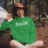 This cozy and comfortable Camping hoodie is the ultimate must-have for anyone who loves the great outdoors.